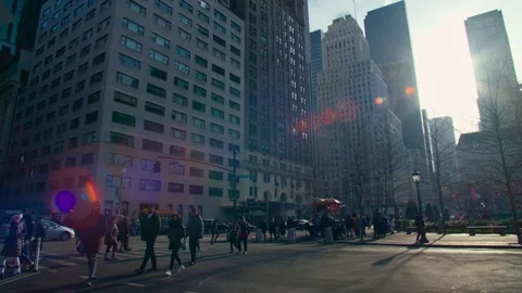 Pedestrians at a Sunlit Manhattan Intersection Stock Footage 348090799