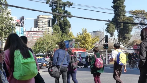 Pedestrians wait on the sidewalk Stock Footage 96584920