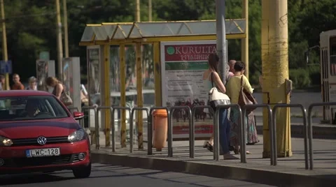 Pedestrians waiting for the tram Stock Footage 65089179