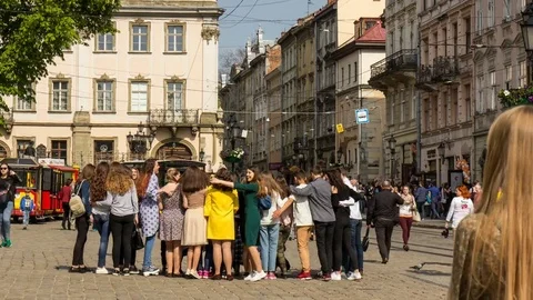Pedestrians Walking on Cobblestone Square. Stock Footage 75391379
