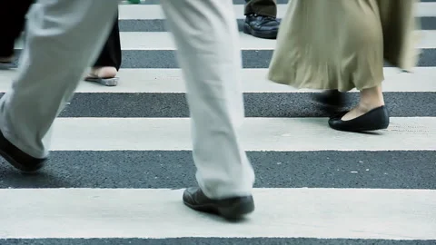 Pedestrians at a Zebra Crossing in a Central Buenos Aires Street, Low Angle - 4K Stock Footage 284754297