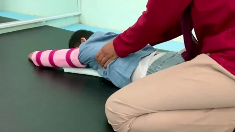 Pediatric Physiotherapy Session for child with Cerebral Palsy Rehabilitation Stock Footage 339566710