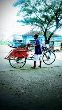 Pedicab driver Stock Photos