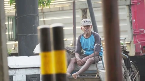 Pedicab Driver Waiting for Passengers Stock Footage 346014730