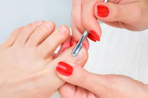 Pedicure applying Stock Photos