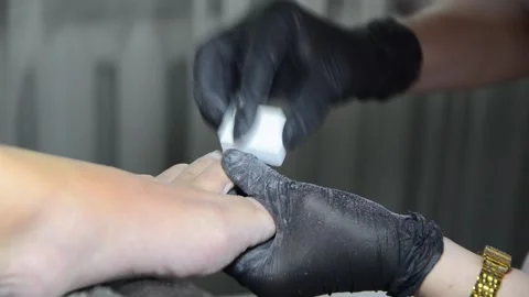 Pedicure Master Buffing Toenails with Nail Buffer Close Up Stock Footage 341506901