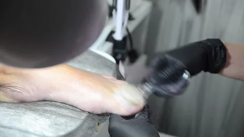 Pedicure Master Cleaning Toenails with Brush After Filing Close Up 스톡 동영상 340144170