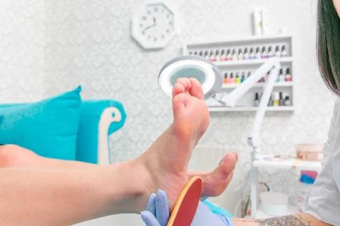 Pedicure master during work. Фото
