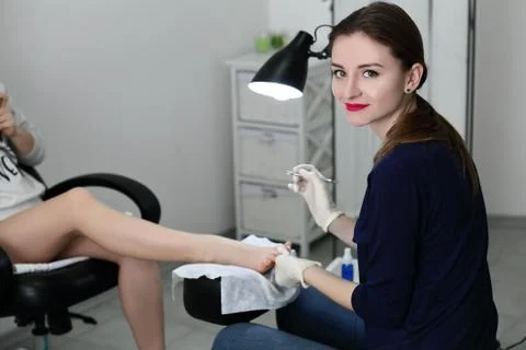 Pedicure master smiling Foto stock