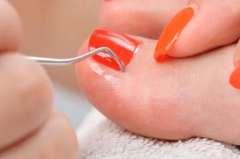 Pedicure process macro closeup Stock Photos