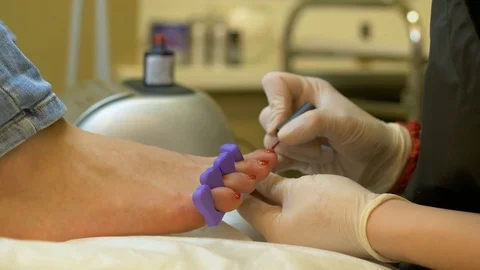 Pedicure with red varnish Видео 79307601