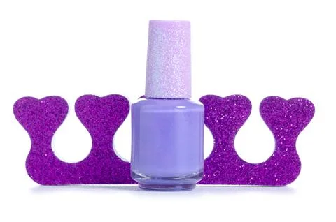 Pedicure separators with nail polish Stock Photos
