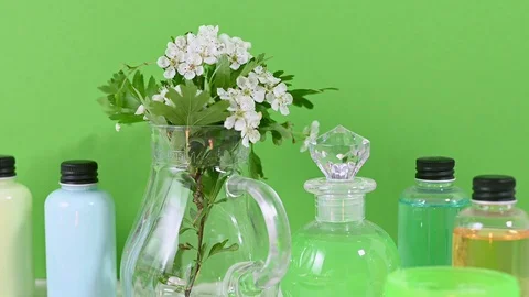 Pedicure tools on table with coloured liquids in bottles Stock Footage 129355507