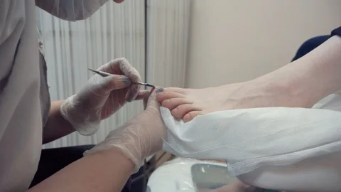 Pedicurist working with pusher Stock Footage 87825329