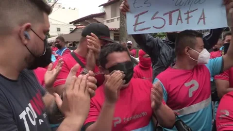 PedidosYa delivery workers on strike for better working conditions in Panama, Pa Stock Footage 204146076