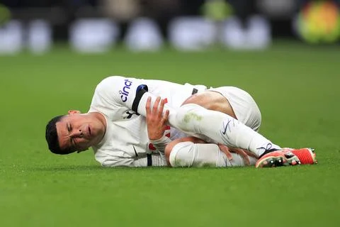  Pedro Porro of Tottenham Hotspur wincing in pain during the Premier Leagu... Stock Photos
