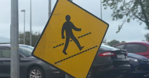 Pedstrian walking sidewalk path yellow safety sign Stock Footage 327488412