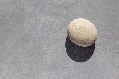 Peeble on gray backdrop Stockfoto's