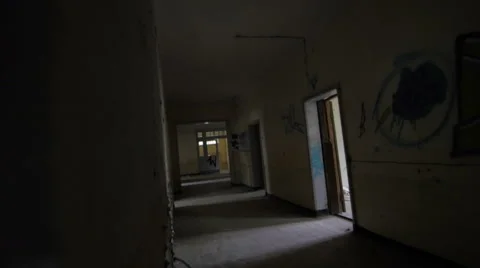 Peeking into an abandoned building Stock Footage 58610644