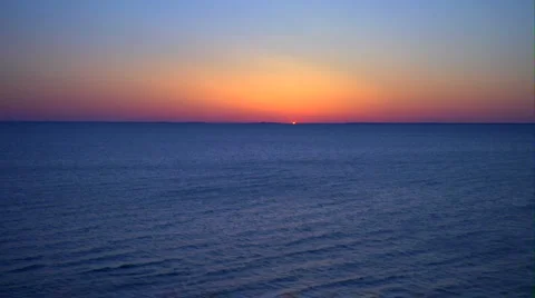 Peeking Sun over Bay Video stock 1064893