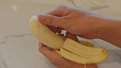 Peel a Banana from the Bottom Video stock 332854236