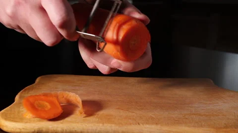 Peel carrots Stock Footage 148243374