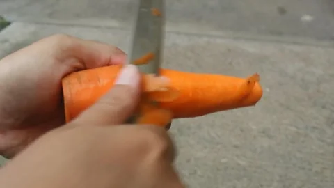 Peel carrots Stock Footage 242171288