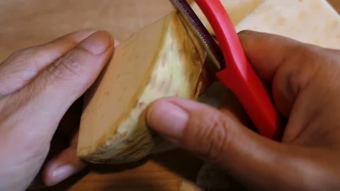 Peel celery with vegetable peeler 스톡 동영상 112866708