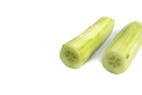 Peel off cucumbers on a white background Stock Photos