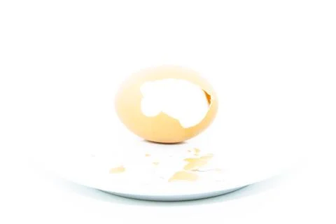 Peel eggshell on white plate Stock Photos