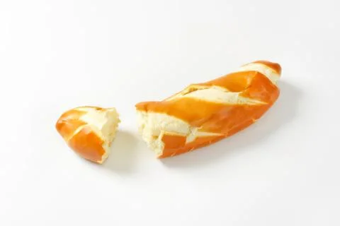 Peel of orange with bread on white background Foto stock