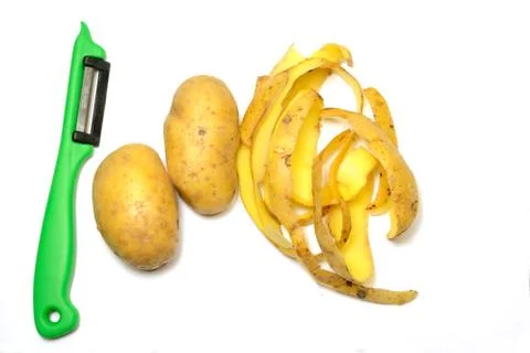 Peel potatoes Stock Photos
