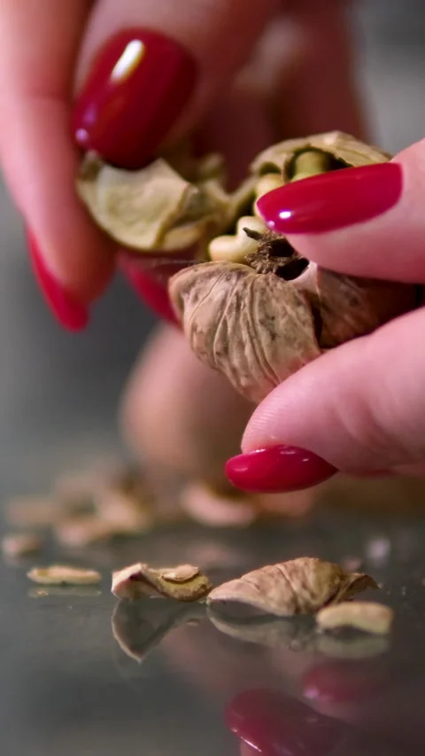 Peel walnuts Scene of peeled and unpeeled walnuts, a nutritious and delicious Stock Footage 291255762