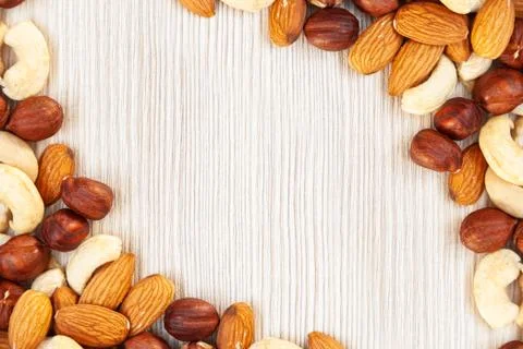 Peeled  almonds, cashew,  hazelnut   pattern. Macro background texture of fro 스톡 사진