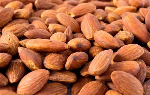 Peeled almonds closeup. For vegetarians. Stock Photos