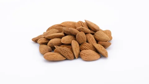 Peeled almonds isolated on white background Stock Footage 88803679