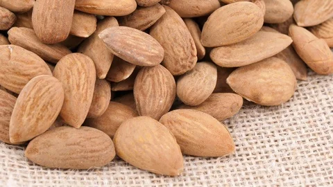 Peeled almonds rotating (not loopable) Stock Footage 88874612