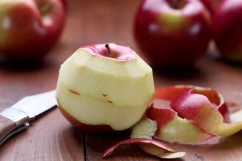 Peeled apple Stock Photos