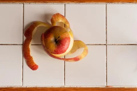 Peeled apple Stock Photos
