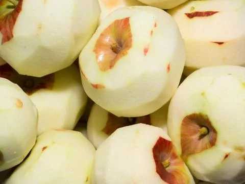 Peeled apples Stock Photos
