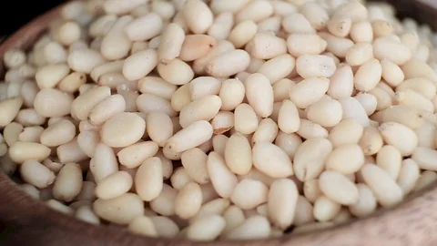 Peeled cerad nuts Stock Footage 127219724