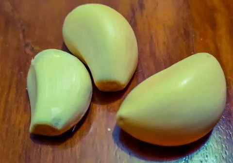 Peeled garlic Stock Photos