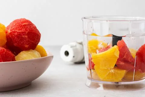 Peeled grapefruits, oroblancos and oranges Stock Photos