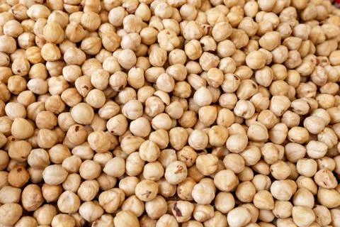 Peeled hazelnuts, background Stock Photos