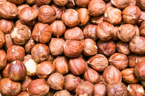 Peeled hazelnuts, cobnuts background or texture Stock Photos
