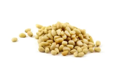 Peeled kernels of pine nuts Stock Photos