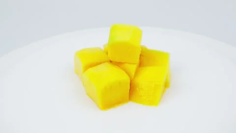 Peeled Mango Rotating on White Background Isolated Stock Footage 325349684