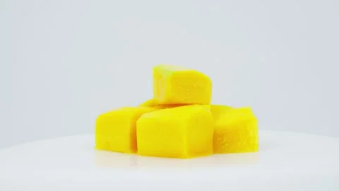 Peeled Mango Rotating on White Background Isolated Stock Footage 325349717