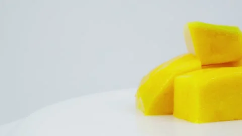 Peeled Mango with White Copy Space for Presentation Stock Footage 325349105