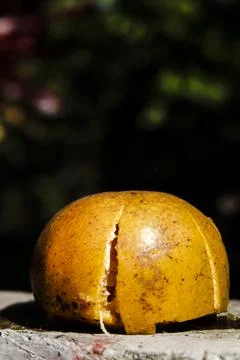 A peeled orange sitting on a table Stock Photos